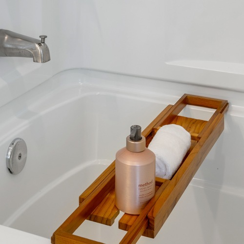 Relax and unwind in stylish living spaces a bath shelf over a bathtub